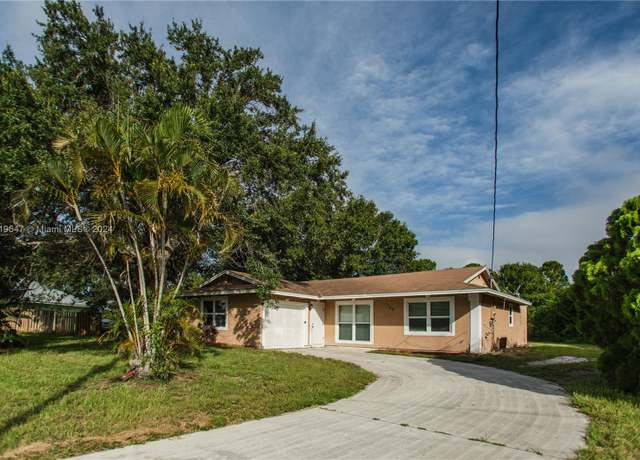 Property at 1702 SW Boeing St, Port St. Lucie, FL 34953, 3 beds, 2 baths