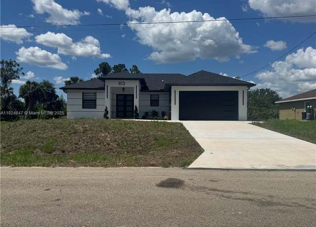 Property at 813 Porter St E, Lehigh Acres, FL 33974, 3 beds, 2 baths