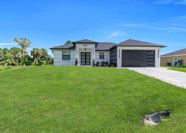 Property at 813 Porter St E, Lehigh Acres, FL 33974, 3 beds, 2 baths