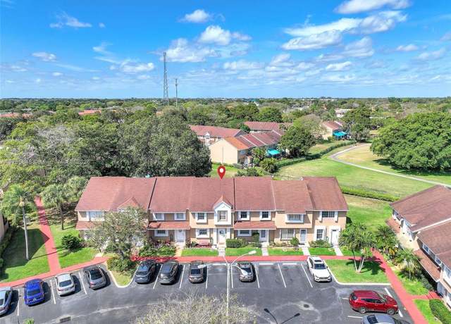 Property at 7068 Woodmont Ave #7068, Tamarac, FL 33321, 3 beds, 2.5 baths