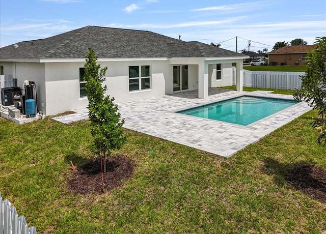 Property at 1220 NW 14th Pl, Cape Coral, FL 33993, 4 beds, 3 baths
