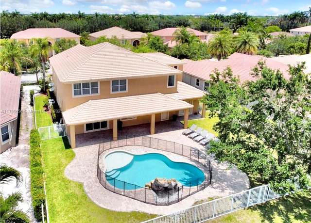 Property at 19506 N Coquina Way, Weston, FL 33332, 5 beds, 5 baths