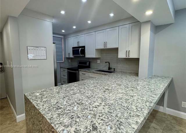 Property at 8437 Forest Hills Dr #103, Coral Springs, FL 33065, 2 beds, 2 baths