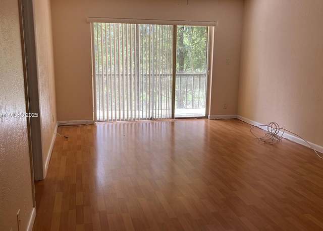 Property at 8060 Fairview Dr #208, Tamarac, FL 33321, 1 bed, 1.5 baths