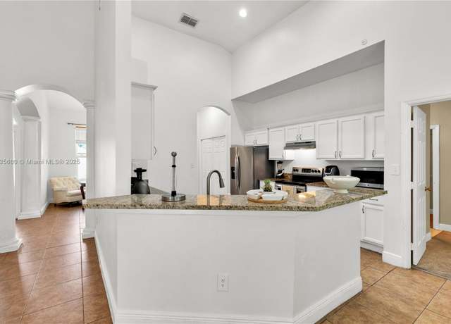 Property at 334 Colony St, Kissimmee, FL 34758, 4 beds, 2 baths