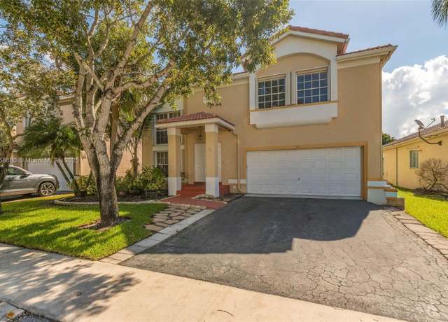 Property at 161 Granada Ave, Weston, FL 33326, 5 beds, 2.5 baths
