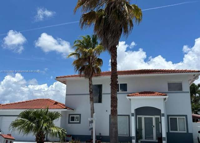 Property at 12923 SW 207th Ter, Miami, FL 33177, 4 beds, 3 baths