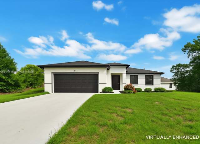 Property at 105 E 14th St, Lehigh Acres, FL 33972, 3 beds, 2 baths