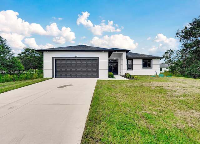 Property at 105 E 14th St, Lehigh Acres, FL 33972, 3 beds, 2 baths