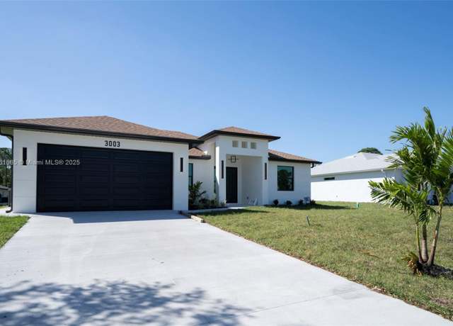 Property at 3003 52nd St W, Lehigh Acres, FL 33971, 4 beds, 2 baths