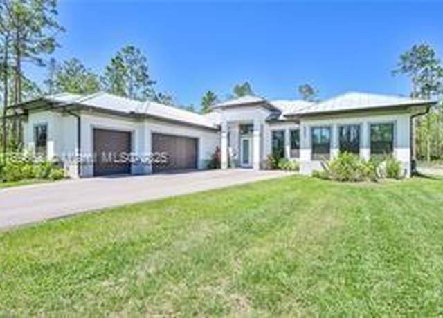 Property at 4063 NE 8th Ave, Naples, FL 34120, 4 beds, 3.5 baths