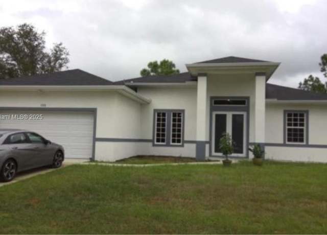 Property at 105 E 15th St, Lehigh Acres, FL 33972, 4 beds, 3 baths