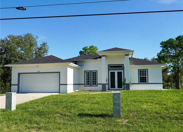 Property at 105 E 15th St, Lehigh Acres, FL 33972, 4 beds, 3 baths
