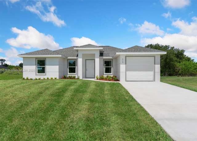 Property at 418 Pinehurst Ave, Lehigh Acres, FL 33974, 3 beds, 2 baths