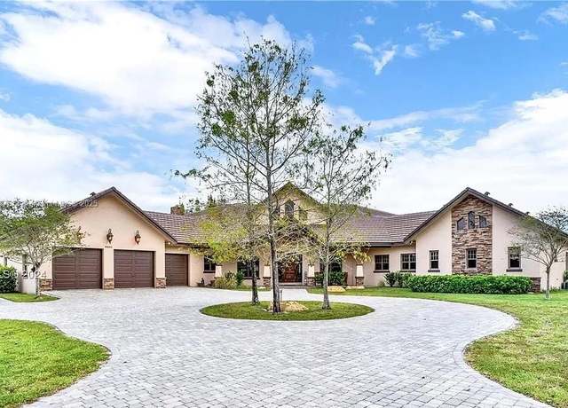 Property at 9401 NW 44th Pl, Coral Springs, FL 33065, 7 beds, 4.5 baths