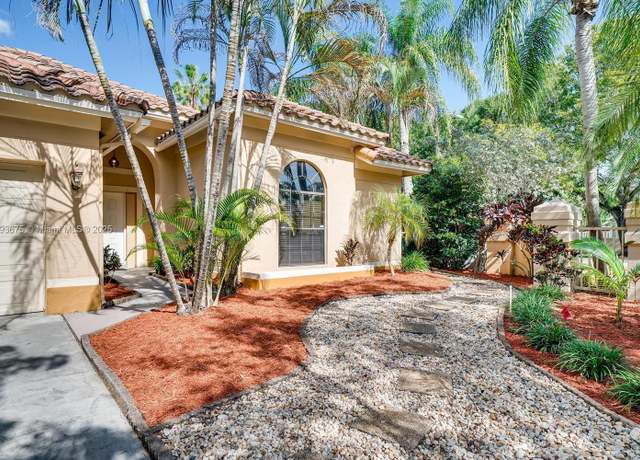 Property at 11675 Berry Dr, Cooper City, FL 33026, 4 beds, 2 baths