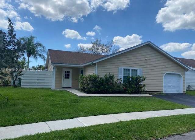 Property at 14953 SW 143rd Ct, Miami, FL 33186, 3 beds, 2 baths