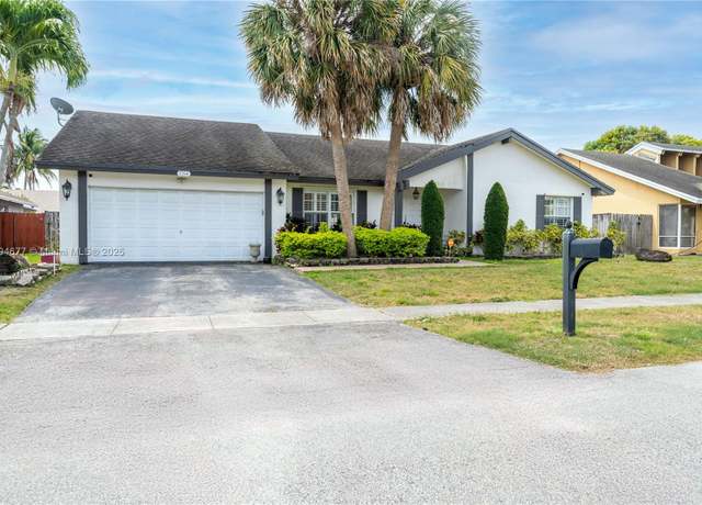 Property at 7354 NW 49th Ct, Lauderhill, FL 33319, 4 beds, 2 baths