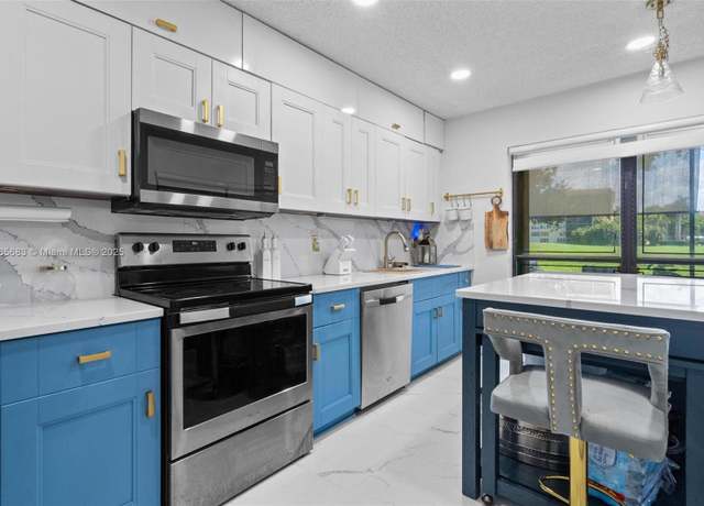 Property at 3549 W Inverrary Blvd W, Lauderhill, FL 33319, 2 beds, 2.5 baths