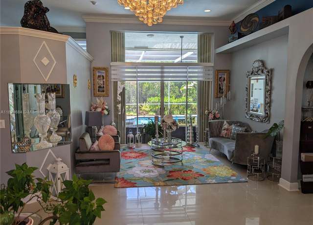 Property at 1496 NW 127th Way, Coral Springs, FL 33071, 6 beds, 4 baths