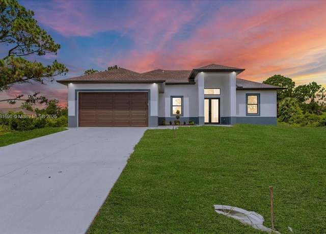 Property at 624 Beach Ave S, Lehigh Acres, FL 33974, 4 beds, 2 baths