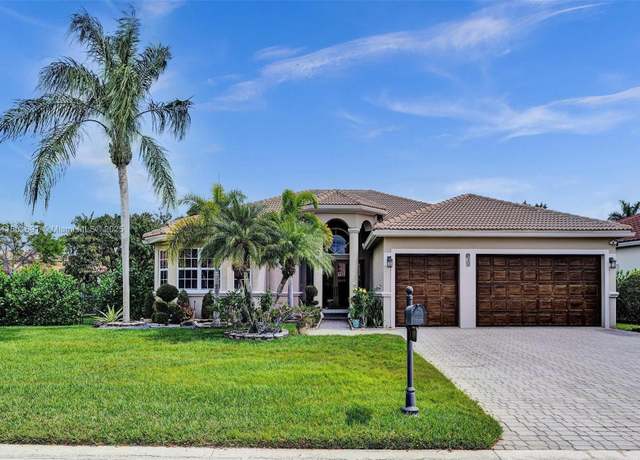 Property at 4985 NW 120th Ave, Coral Springs, FL 33076, 5 beds, 3.5 baths