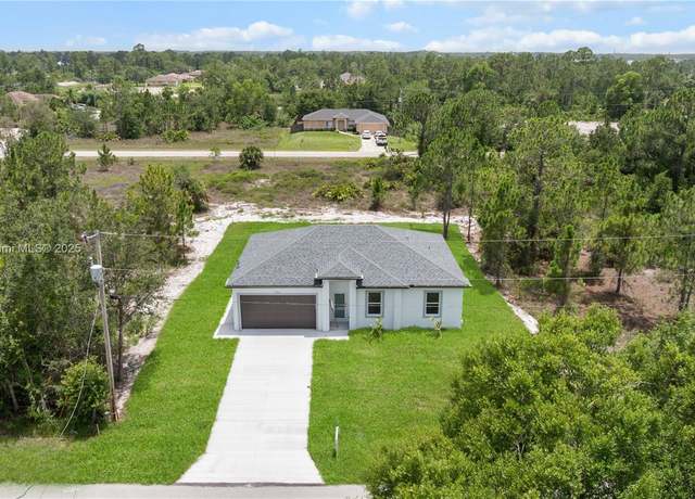Property at 858 Portland St E, Lehigh Acres, FL 33974, 3 beds, 2 baths
