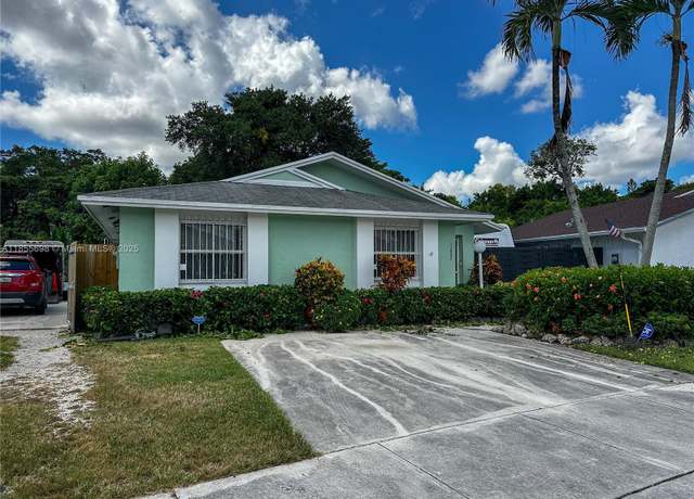 Property at 11942 SW 210th St, Miami, FL 33177, 3 beds, 2 baths