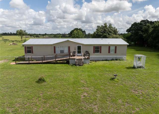 Property at 1176 Sugar Palm St, La Belle, FL 33935, 4 beds, 2 baths