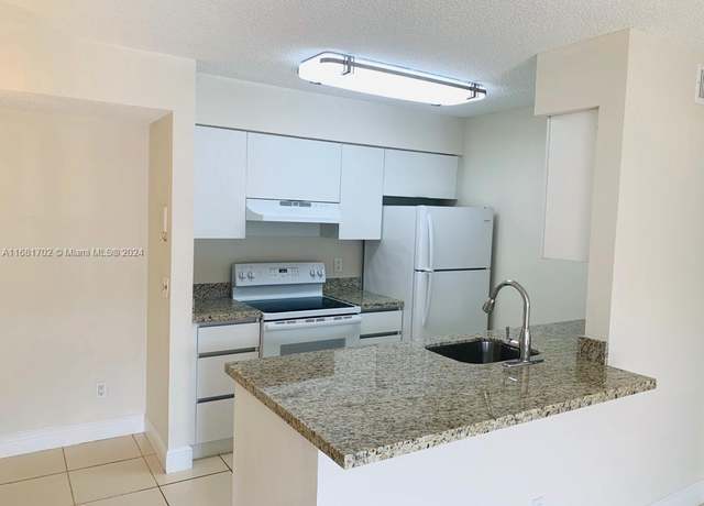 Property at 10477 NW 7th St #104, Pembroke Pines, FL 33026, 2 beds, 2 baths