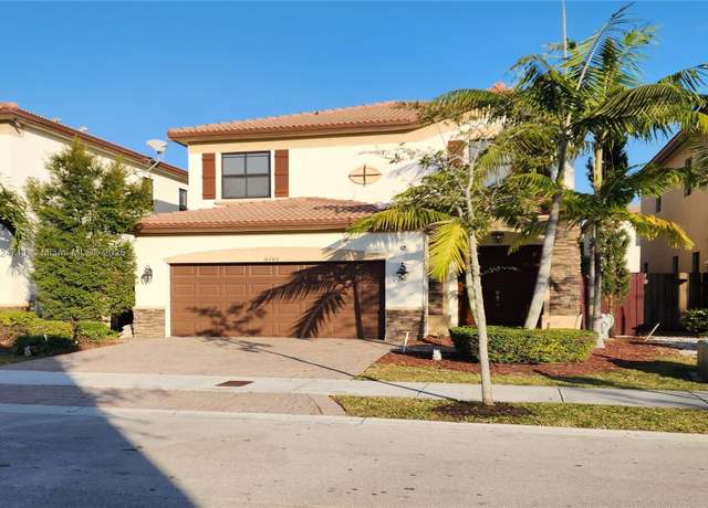 Property at 8745 NW 100th Pl, Doral, FL 33178, 4 beds, 3.5 baths