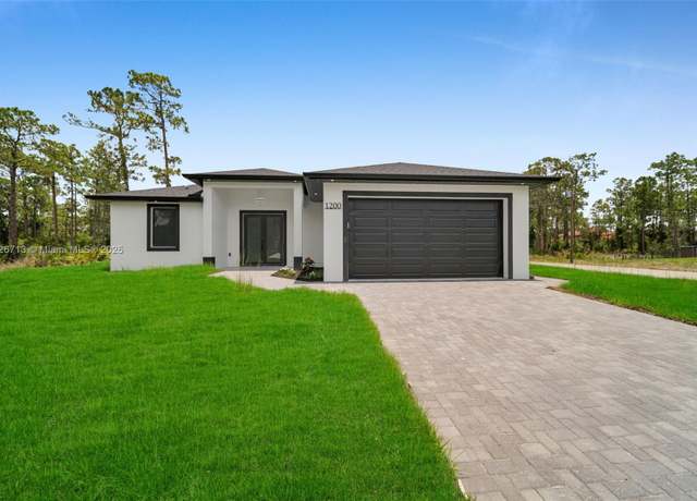 Property at 1200 W 11th St, Lehigh Acres, FL 33972, 3 beds, 2 baths