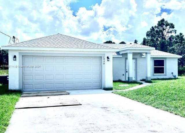 Property at 1034 Pilgrim St, Lehigh Acres, FL 33974, 3 beds, 2 baths