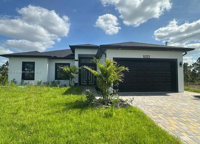 Property at 1022 Candleligth St, Lehigh Acres, FL 33974, 3 beds, 2 baths