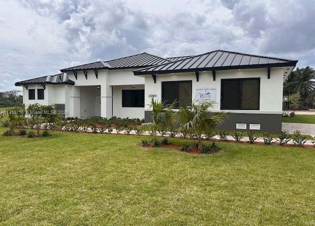 Property at 24480 SW 209th Pl, Homestead, FL 33031, 5 beds, 4 baths