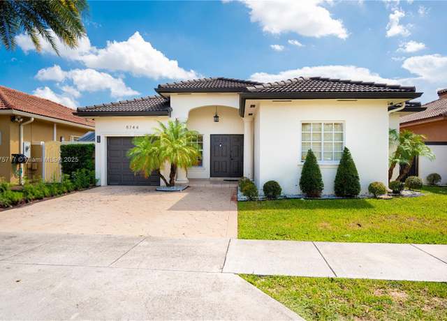 Property at 8744 NW 147th Ln, Miami Lakes, FL 33018, 4 beds, 2 baths