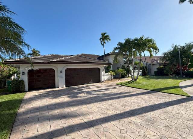 Property at 320 Windmill Palm Ave, Plantation, FL 33324, 4 beds, 3 baths