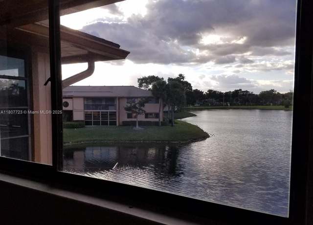 Property at 9873 N Belfort Cir #215, Tamarac, FL 33321, 2 beds, 2 baths