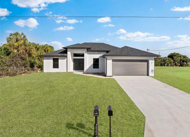 Property at 821 Porter St E, Lehigh Acres, FL 33974, 4 beds, 2 baths
