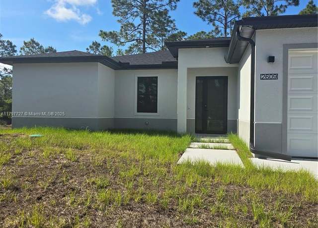 Property at 2609 53rd St W, Lehigh Acres, FL 33971, 3 beds, 2 baths