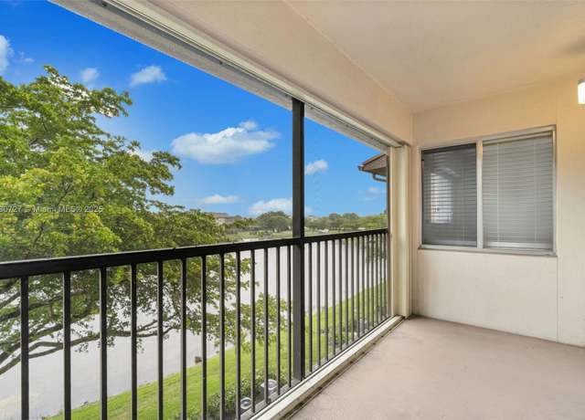 Property at 13701 SW 12th St Unit 405A, Pembroke Pines, FL 33027, 2 beds, 1.5 baths