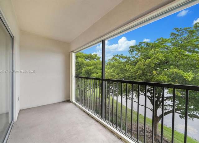Property at 13701 SW 12th St Unit 405A, Pembroke Pines, FL 33027, 2 beds, 1.5 baths