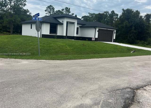 Property at 1306 W 15 Th St, Lehigh Acres, FL 33972, 3 beds, 2 baths