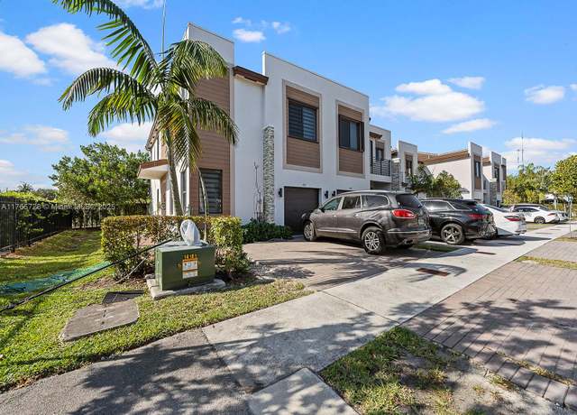 Property at 402 NE 211th Ter, Miami, FL 33179, 4 beds, 3.5 baths