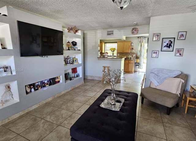 Property at 7501 Kimberly Blvd #104, North Lauderdale, FL 33068, 2 beds, 1.5 baths