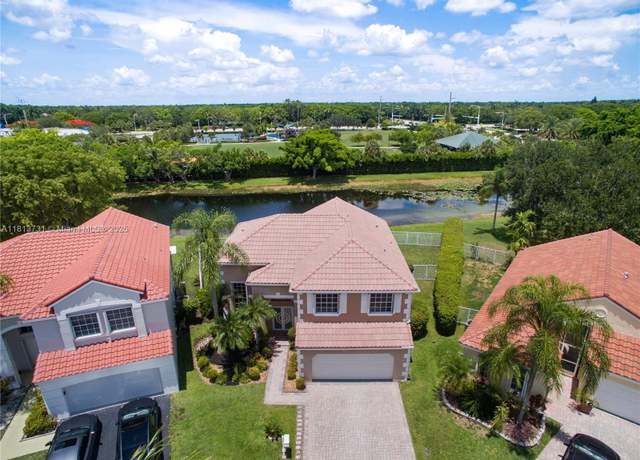 Property at 210 Somerset Way, Weston, FL 33326, 4 beds, 2.5 baths