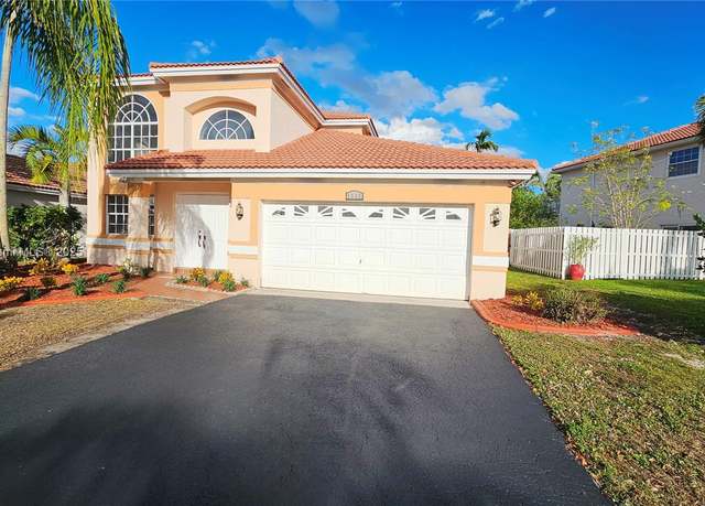 Property at 1336 NW 129th Way, Sunrise, FL 33323, 4 beds, 2.5 baths
