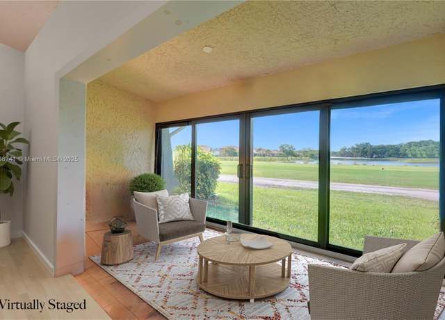 Property at 8406 NW 78th Ct, Tamarac, FL 33321, 2 beds, 2 baths