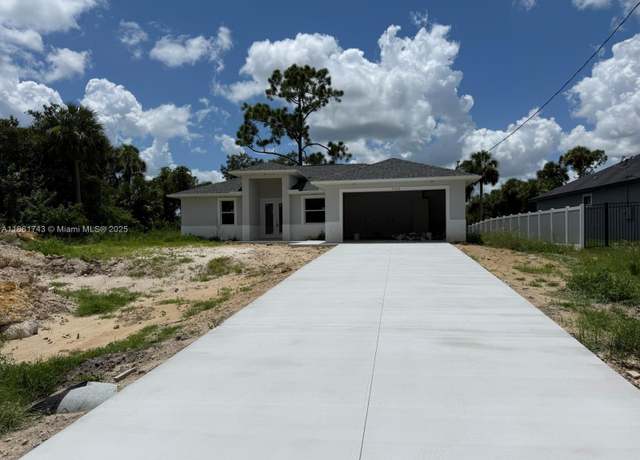 Property at 5028 N Peachtree Cir, La Belle, FL 33935, 4 beds, 2 baths