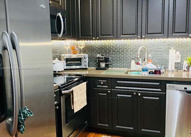Property at 13255 SW 7th Ct Unit 213D, Pembroke Pines, FL 33027, 2 beds, 1.5 baths